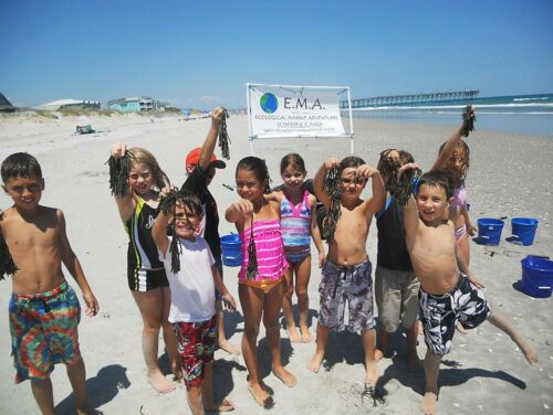 EMA kids on beach.c752fc0e