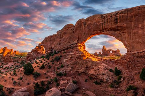 Evening,Light,Over,North,Window,With,Turret,Arch,In,The Evening light over North Window with Turret Arch in the distance, Arches National Park Utah