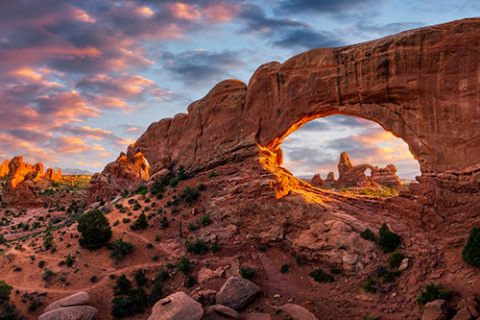 Evening light over North Window with Turret Arch in the distance, Arches National Park Utah